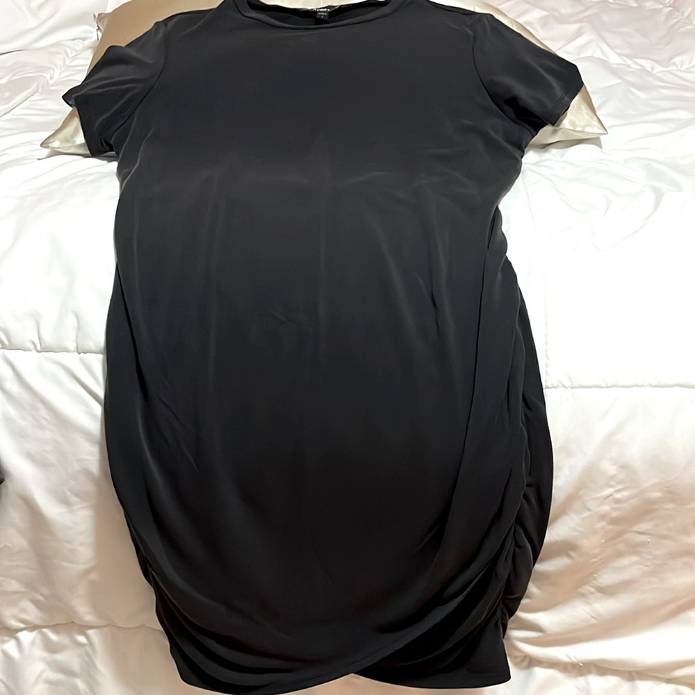 Short sleeve rouched jersey knit dress.